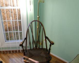 Smaller, antique chair and brass floor lamp