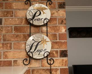 This wall plate rack is one of two.  There's another to the left of the fireplace.  