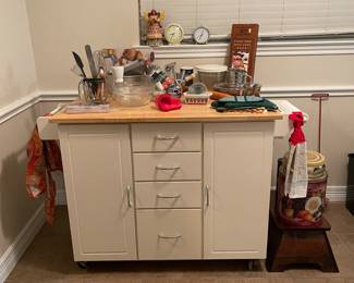 Portable kitchen work counter, space, and storage.  This is a GREAT piece in GREAT condition.  And if you're into baking and have a little helper check out that stool to the right - very sturdy!