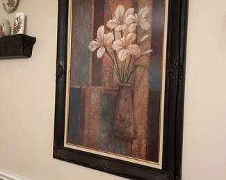 More artwork.  Notice the metal shelf to the left.  There are about 10 throughout the house about 1 foot long, and one above the TV in the living room about 3 feet long.  Great for displaying various items in any room of the house.  They are all in great condition too!