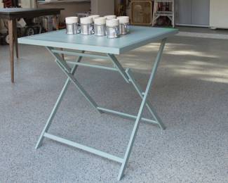 Metal slat folding patio table (26"h x 28" dia):  $68.00 