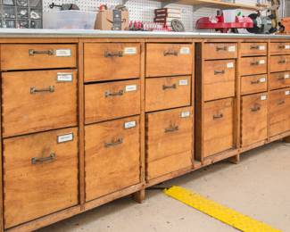 Wood working bench w/dove tail drawers.  Custom designed & hand crafted (by a furniture maker) w/metal Custom made work bench.  Metal top & 18 drawers.  The metal top has a lip on the back and a small tray edge at the front so you don't loose your screw, nails and what not (3'h x 8'w x 30"d):  $580.00
