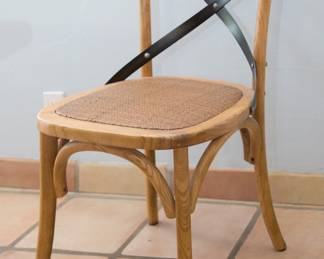 Arhaus Furniture Cafe Chairs.  Wood, metal & rattan.  8 chairs available @:  $180.00 ea.