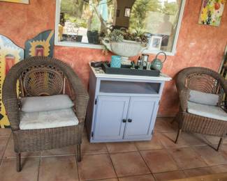 Left to right:  Woven wicker rattan armchair:  $60.00.  Tiled rolling cart w/2 cupboards:  $68.00, Bamboo and rattan set of (2) chairs:  $140.00 pr.