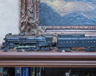 Vtg. 1956 Lionel Train Set:  Engine #2018 plus 8 amazing cars.  Includes track pcs., transformer #1053, switch & cross tracks, Plasticville village set, Original boxes, accessories and booklet.  A True Blast From The Past!  $460.00