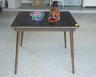 MCM wood gaming or side table with fabulous legs, naugahyde black top and brass hardware:  $380.00