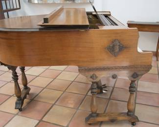 Exterior totally refinished. This gem has double legs.  Purchased at a "grand old home" on the main blvd. in Baton Rouge, LA. in 1984-85 the piano was re-hammered, re-felted & restrung.  Piano keys are new,  the original keys have been replaced.