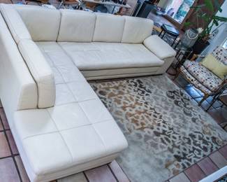 Scandinavian Design Italian Leather "Shape" Sofa and Chaise Lounge.  SOoo comfortable! (width from outside to outside:  10' 3" x height of back:  31" height to seat:  15.5" x Length of attached chaise:  7'3".  Depth of Sofa from back to front of seat:  39".):  $1,600.00