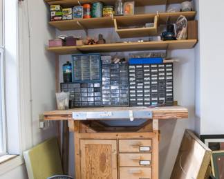 Hand crafted small work table.  Made of Pine and particle board w/dovetail corners.  Four drawers and 1 cupboard (36"h x 40"w x 24"d):  $80.00