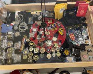 Medals, coins, patches, police handcuffs and so many awards