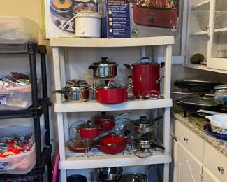 Ready for the holidays with these kitchen sets! Triple slow cooker new in box, Oster Roaster new in box and beautiful cookware