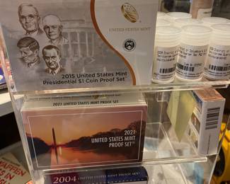 Several sets of coin collections President dollars & uncirculated rolls of coins
