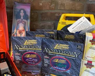 Johnny Lightning Cars new in packages, vintage barbie