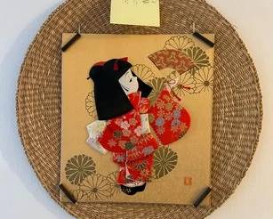Rattan And Embroidered Wall Collage
