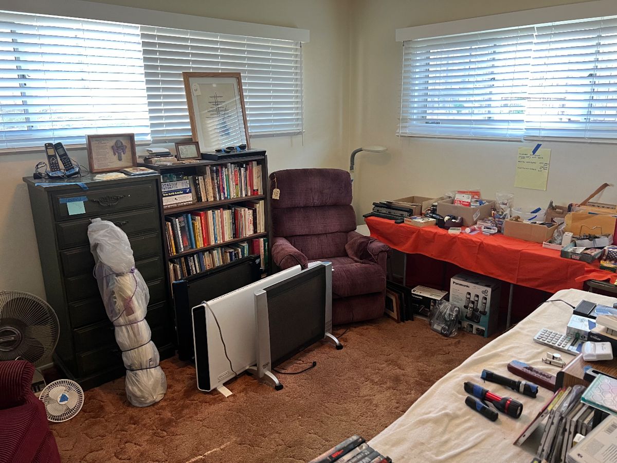 Books, heaters, Lazy boy chairs, lamps, phones