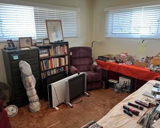 Books, heaters, Lazy boy chairs, lamps, phones
