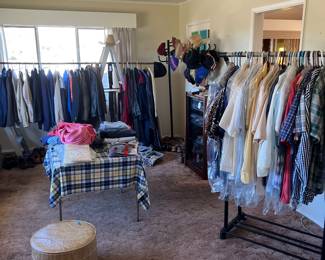 Men's clothes, shoes, hats, bolo ties, belt buckles.