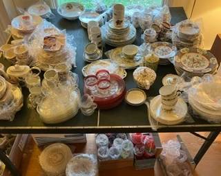 Over 30 sets of dinnerware.