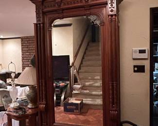9 foot antique armoire with foldout side mirrors
