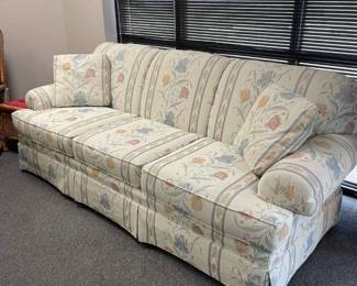 Floral couch with 2 matching accent pillows