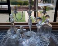 A beautiful selection of Crystal decanters (2 ATLANTIS), Silverplated candellabra on tray