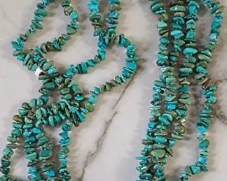 Turquoise beads 98" long. Can be wrapped around in three layers