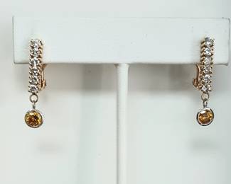 All white and yellow diamond earrings in 14k yellow gold with lever back