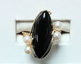 Onyx and pearl ring in 14k 
Sz 6-3/4