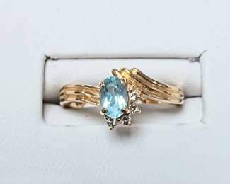 Small Aquamarine ring with diamonds
