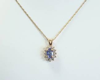 Tanzanite and diamond necklace in 14k gold