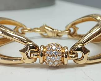 18k Movado bracelet with pave diamonds
Med wrist 