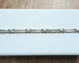 1.00 ct tw Diamond tennis bracelet in 14k white gold.  Approx 7"