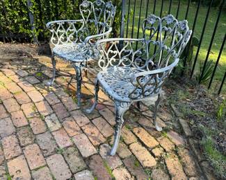 63	$90 	Two aluminium chairs floral									