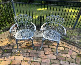 63	$90 	Two aluminium chairs floral									