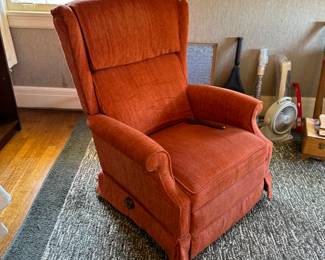 31	$70 	Orange manual recliner 									