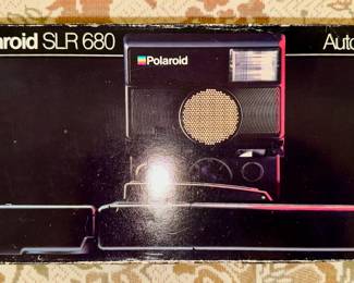Polaroid SLR680 camera in original box.