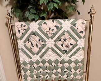 Brass quilt stand.