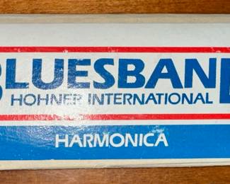 Harmonica in original box.