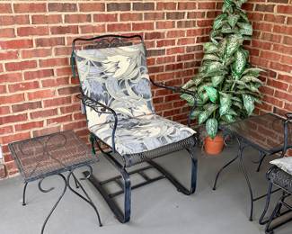 Wrought iron mesh outdoor furniture: gliders, tables and chairs.