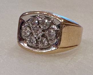 Man's seven diamond ring.  Authenticated by local jeweler and approximated to be .75 ct tw.  Size is maybe 11 or 11.5???