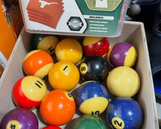 Pool balls and Longhorn bean bags