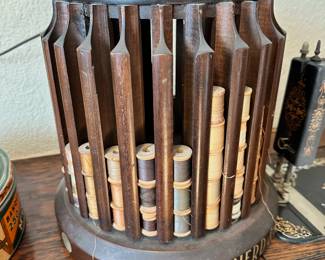 Brainered and Armstrong Spinning spool cabinet, Vintage store display
