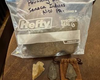 Pounding stone and arrow heads