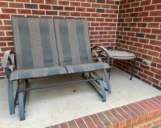 M85 - $50 - glider - just needs a bath! $15 glass top table with metal base