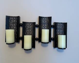 M42 - $12. Metal wall hanging with 4 battery operated candles. 