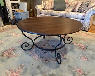 M81 - $100. Charleston Forge Round Coffee Table. Solid Wood top - metal base. Measures 38" across x 18.5" tall. 