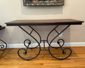 M9 - $95. Entry Table / Sofa Table. Currently used in hallway.  Wooden top with metal base. Measures 20" deep x 50" long x 29.5" tall. Sturdy. 