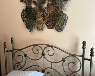 M43 - $175. Full size bed (mattress included if you want it)  Metal frameM44 - $15 metal & peacock feather wall art. 