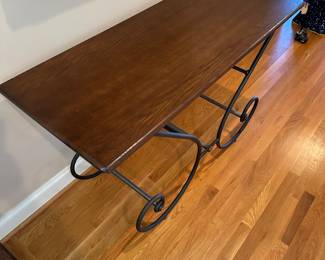 M9 - $95. Entry Table / Sofa Table. Currently used in hallway.  Wooden top with metal base. Measures 20" deep x 50" long x 29.5" tall. Sturdy. 
