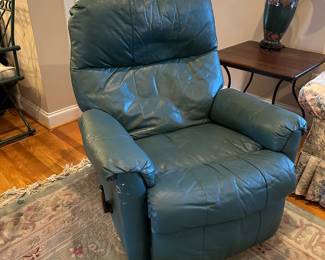 M82 - $40. Franklin Leather rocking recliner. Has cat scratching on front otherwise great condition. 